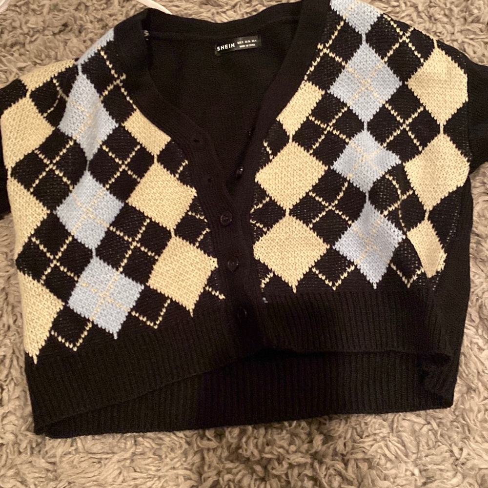 Never worn in great condition. No holes or rips